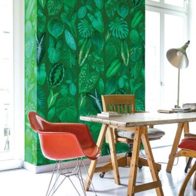 Tropische bladeren op groene achtergrond